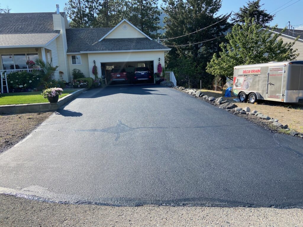 Vernon driveway sealcoat after